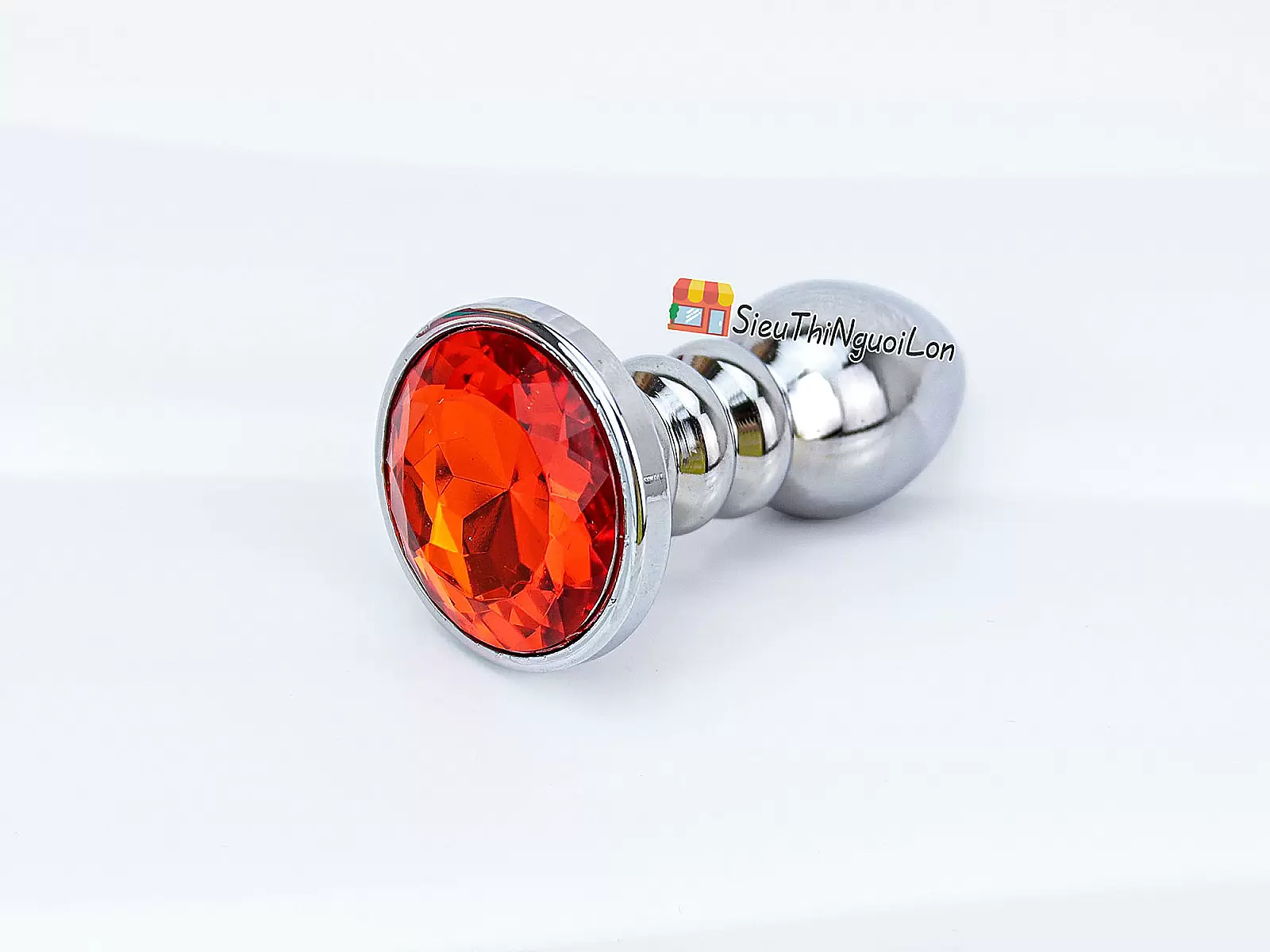 Đồ chơi kích hậu Inox xoắn ốc đuôi pha lê màu cam