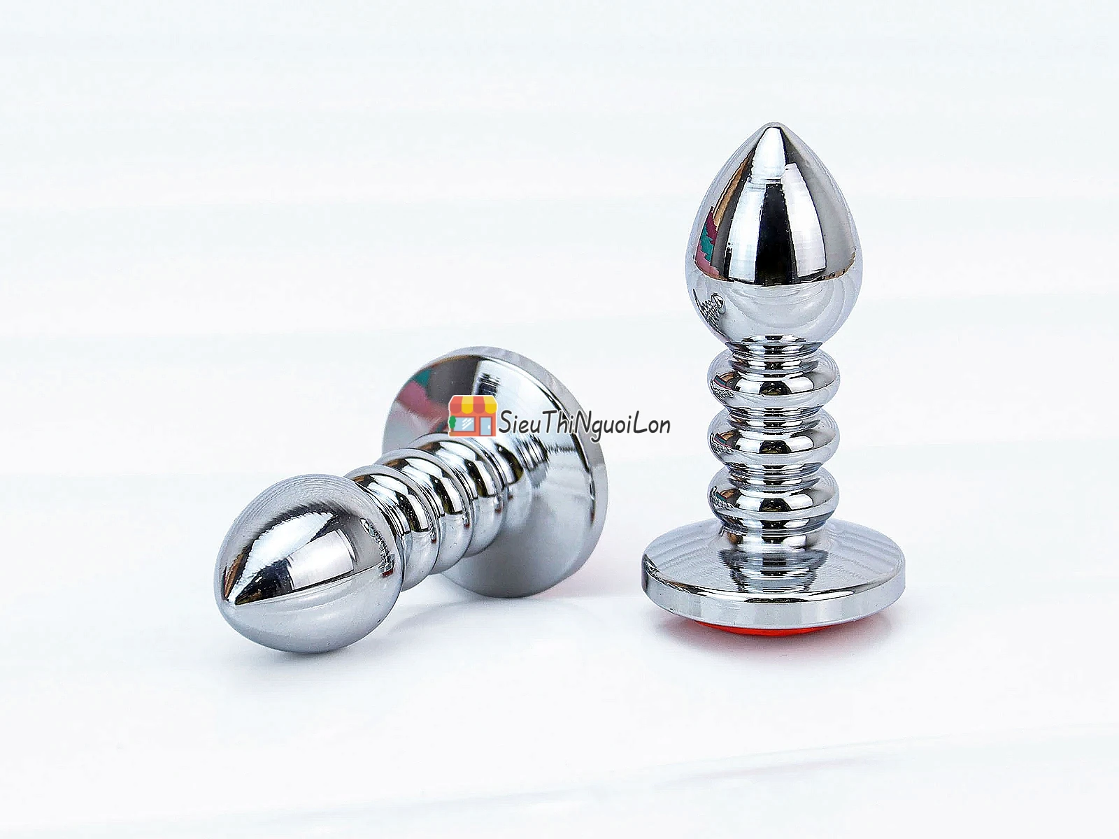 Đồ chơi kích hậu Inox xoắn ốc đuôi pha lê màu cam