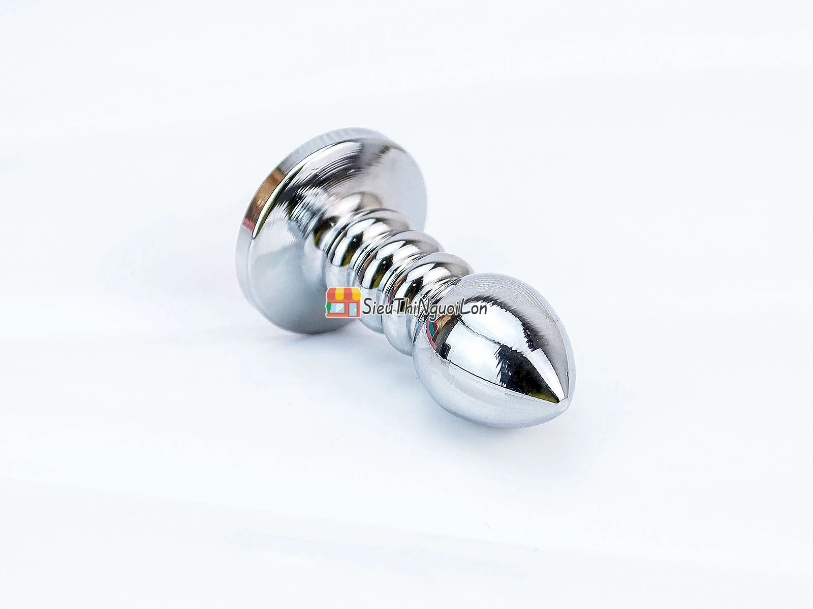 Đồ chơi kích hậu Inox xoắn ốc đuôi pha lê màu cam
