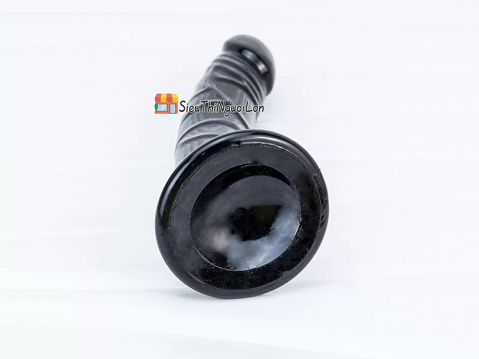 Dương vật giả có đế uốn cong silicon màu đen