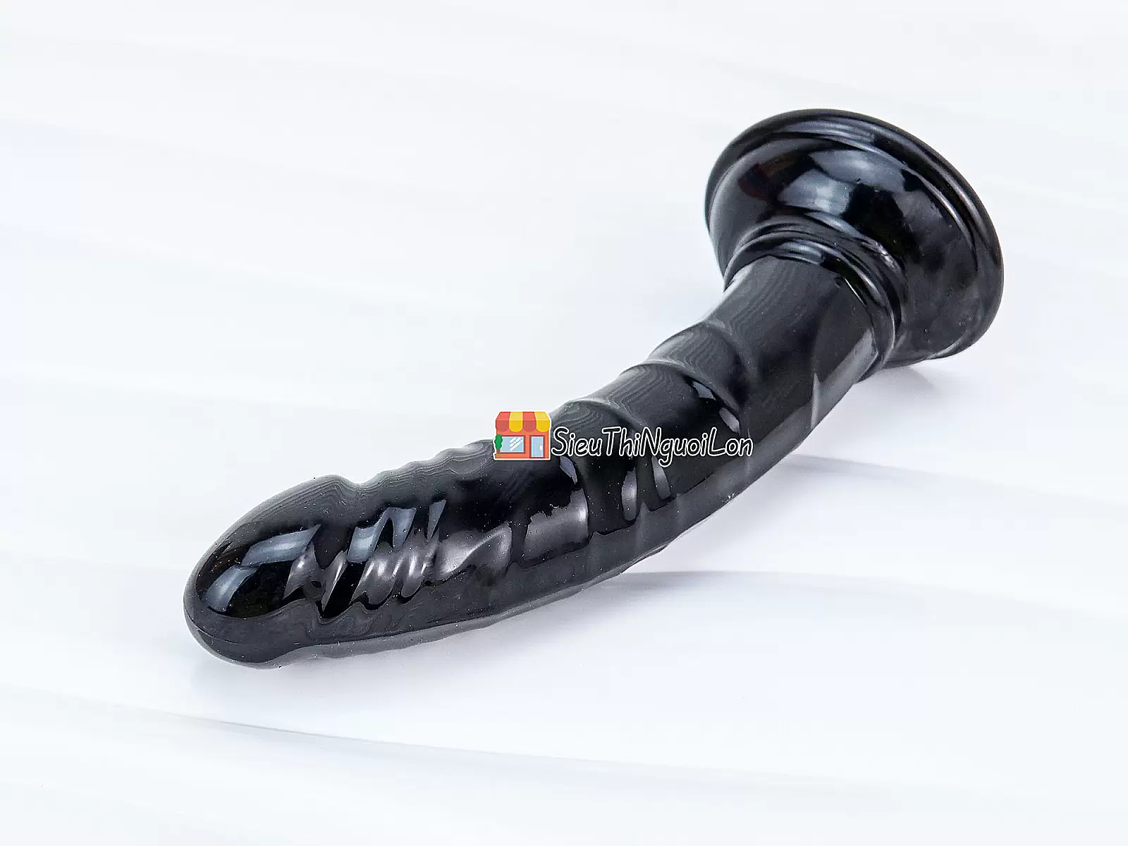 Dương vật giả có đế uốn cong silicon màu đen