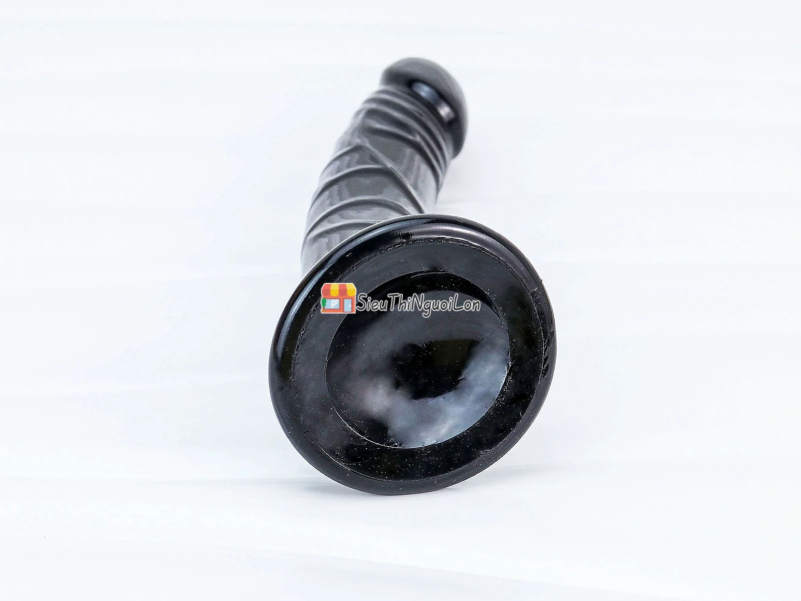 Dương vật giả có đế uốn cong silicon màu đen