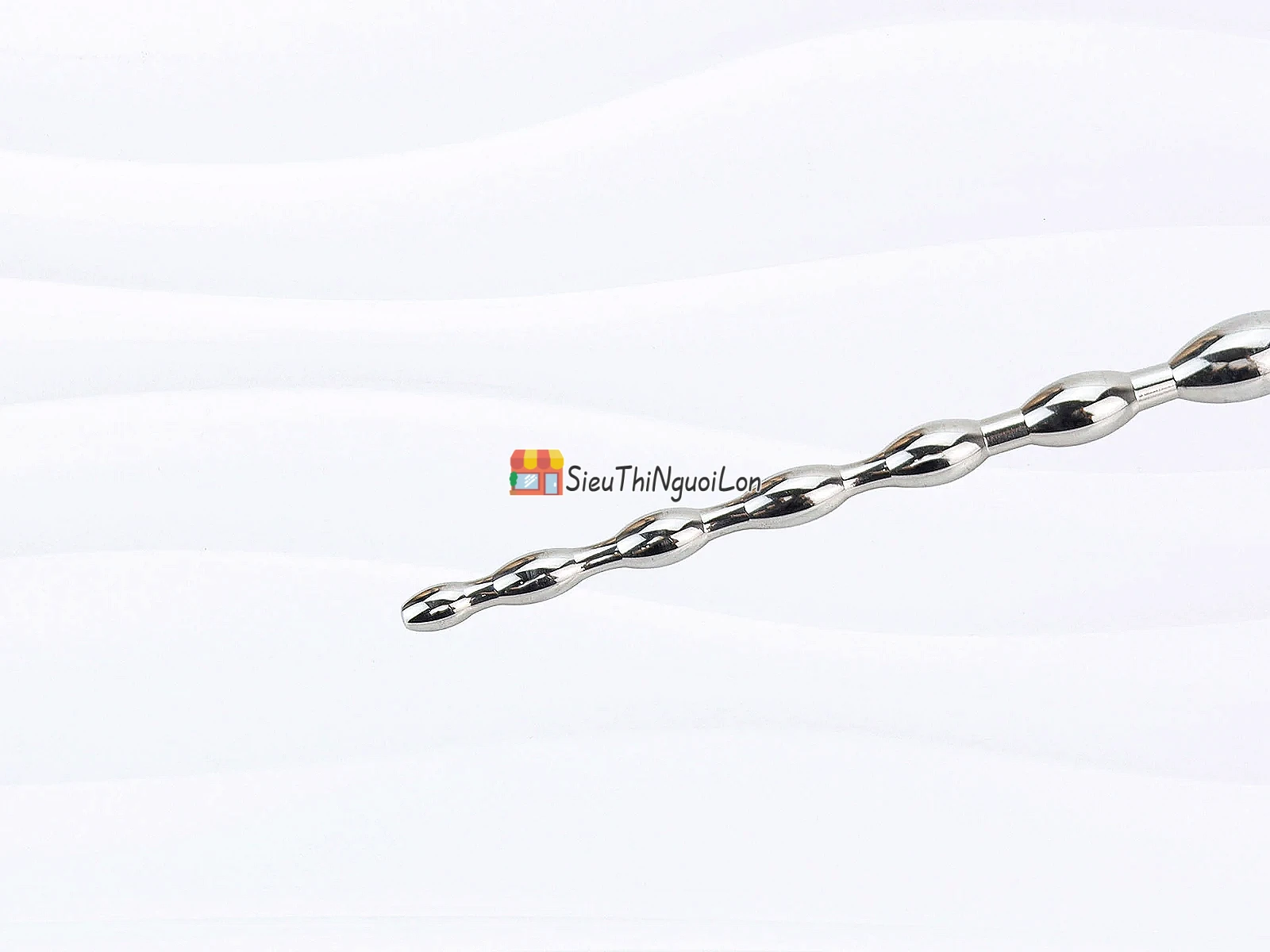 Dụng cụ kích thích niệu đạo có khoen gợn sóng