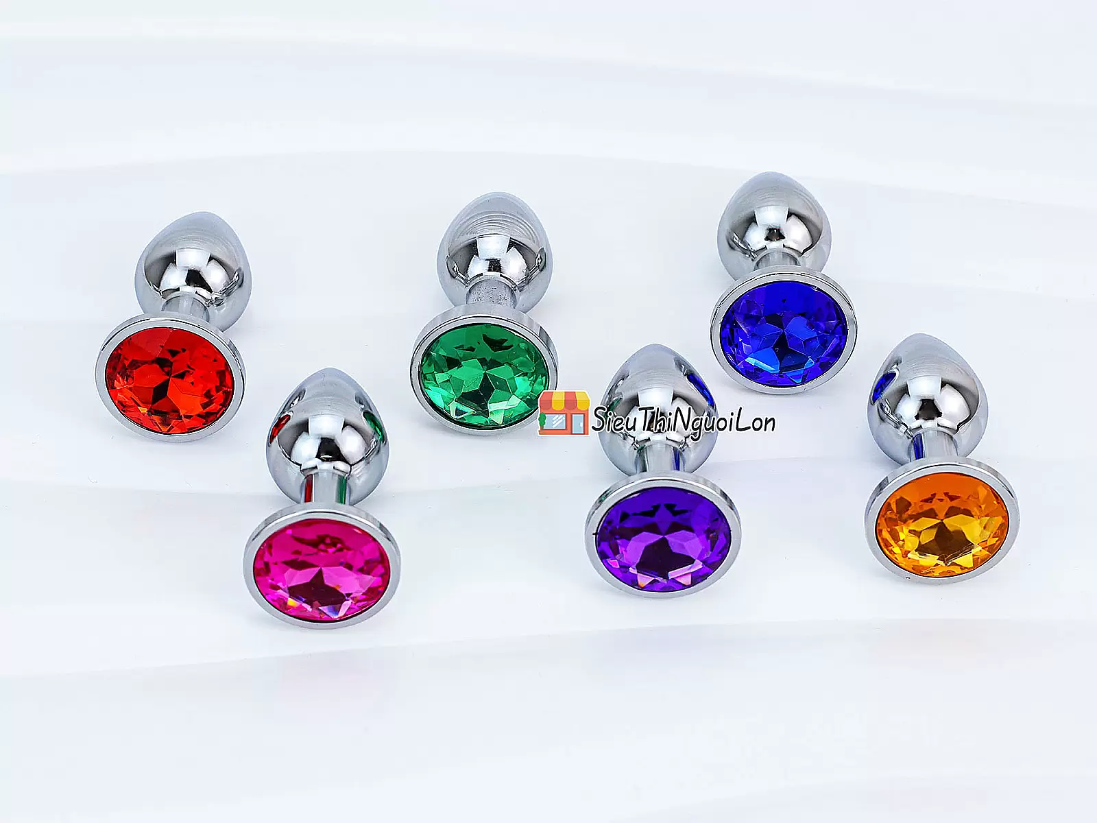 Đồ chơi kích hậu Inox size vừa đế pha lê nhiều màu sắc